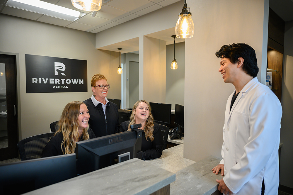dr_richie_speaking_with_staff_in_office dr_richie_speaking_with_staff_in_office
